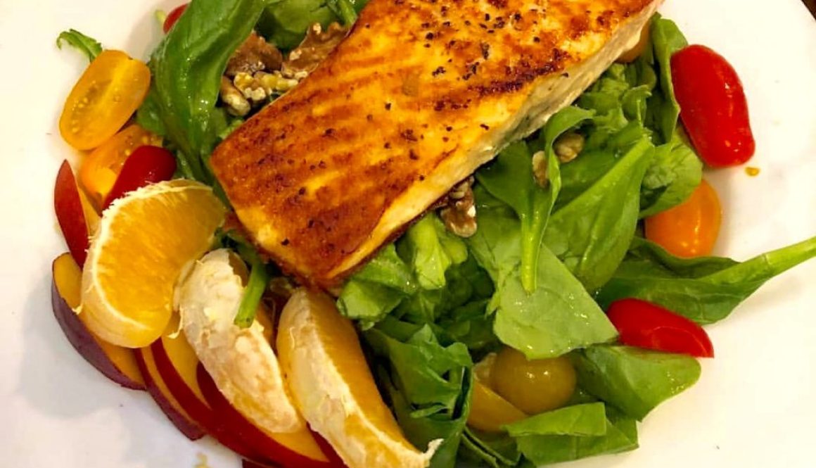 salmon-on-salad-fresh-greens-orange-sections